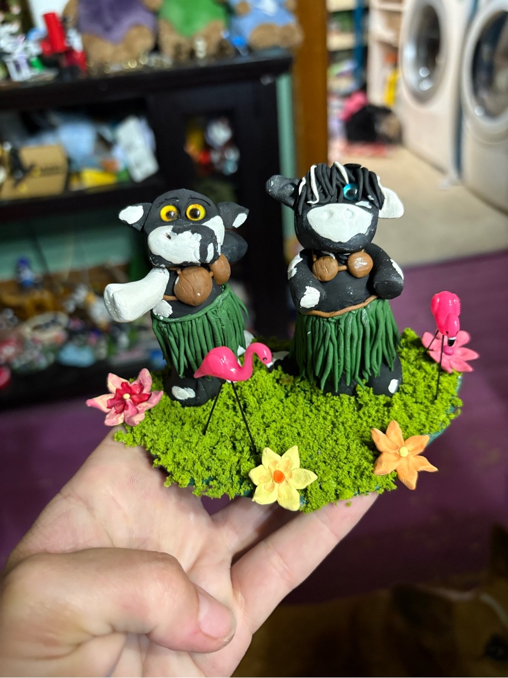 Handcrafted Cow Hula Figurines in Black and Green grass skirts